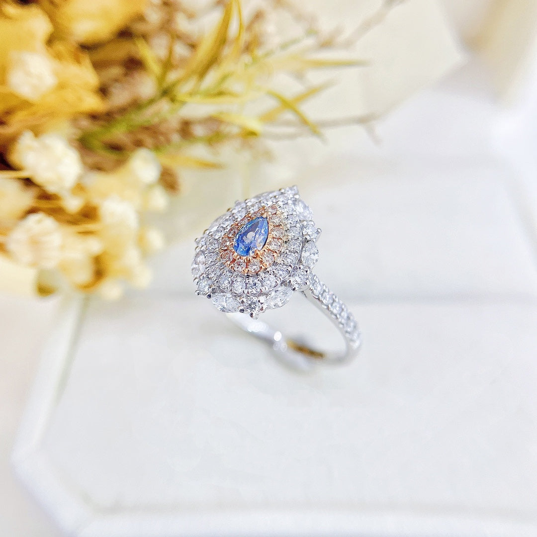 18K Gold Blue Diamond Teardrop Surrounding Marquise Ring | Premium Jewelry - Blue Diamond Ring