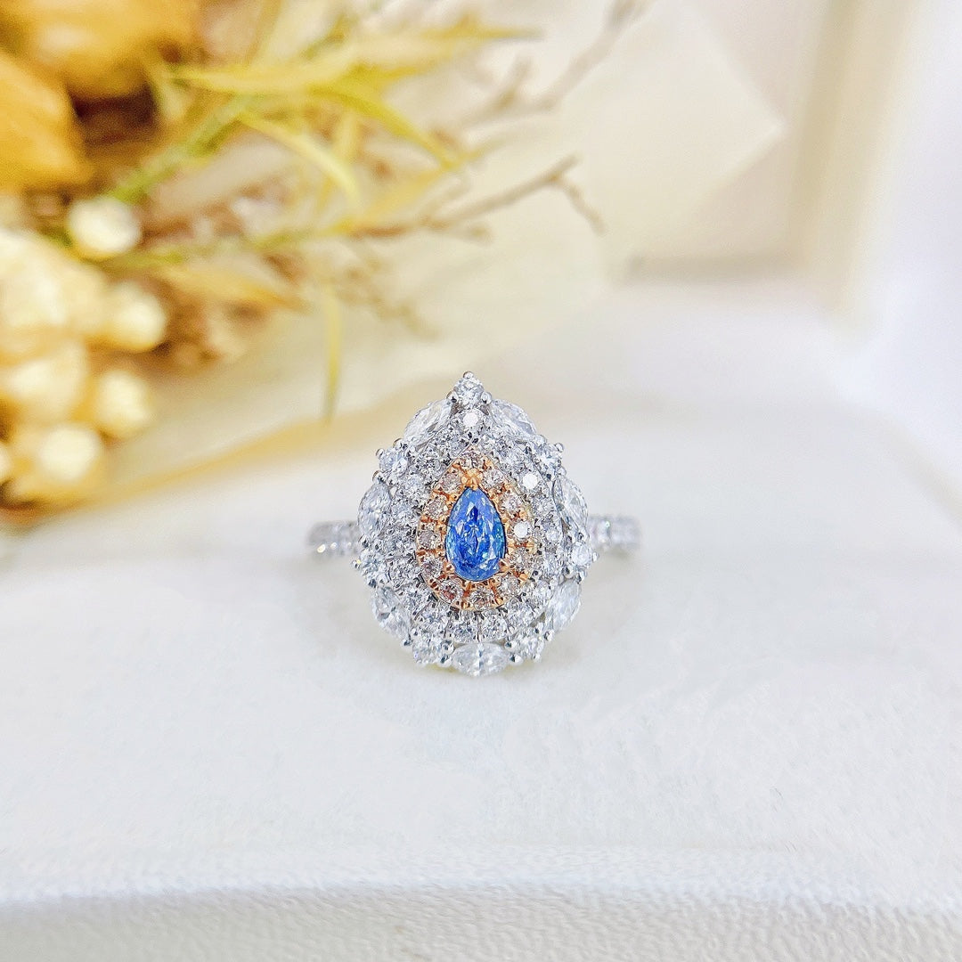 18K Gold Blue Diamond Teardrop Surrounding Marquise Ring | Premium Jewelry - Blue Diamond Ring