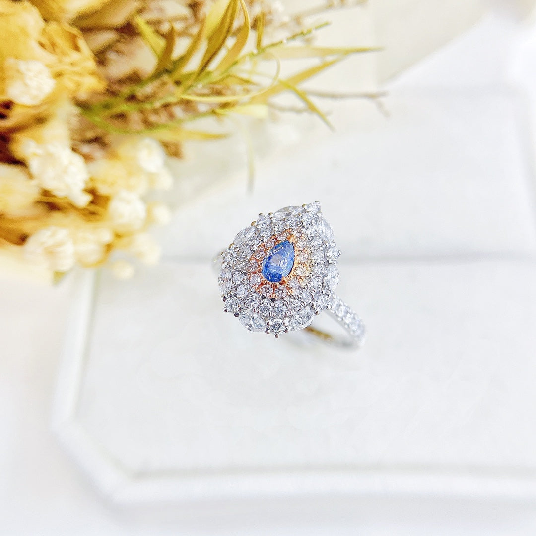 18K Gold Blue Diamond Teardrop Surrounding Marquise Ring | Premium Jewelry - Blue Diamond Ring