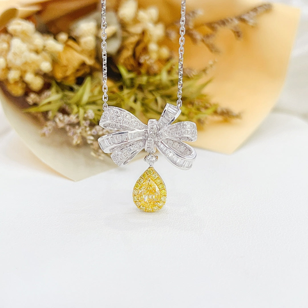 18K Gold Bowknot Pendant with Diamond and Drop Shape Design - Elegant Jewelry Piece - Yellow Diamond Necklace