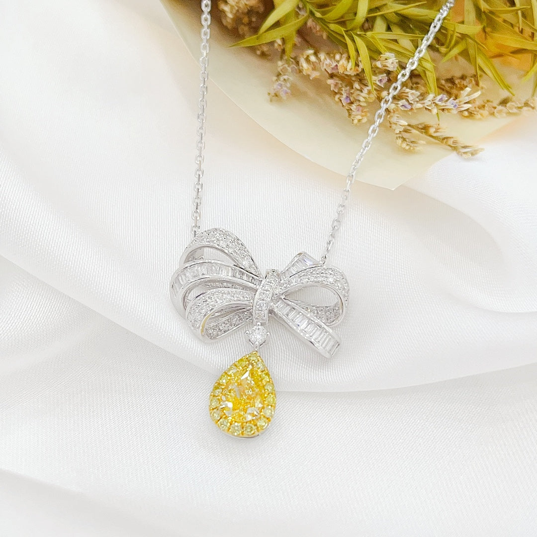 18K Gold Bowknot Pendant with Diamond and Drop Shape Design - Elegant Jewelry Piece - Yellow Diamond Necklace