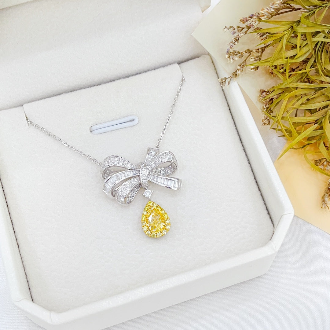 18K Gold Bowknot Pendant with Diamond and Drop Shape Design - Elegant Jewelry Piece - Yellow Diamond Necklace