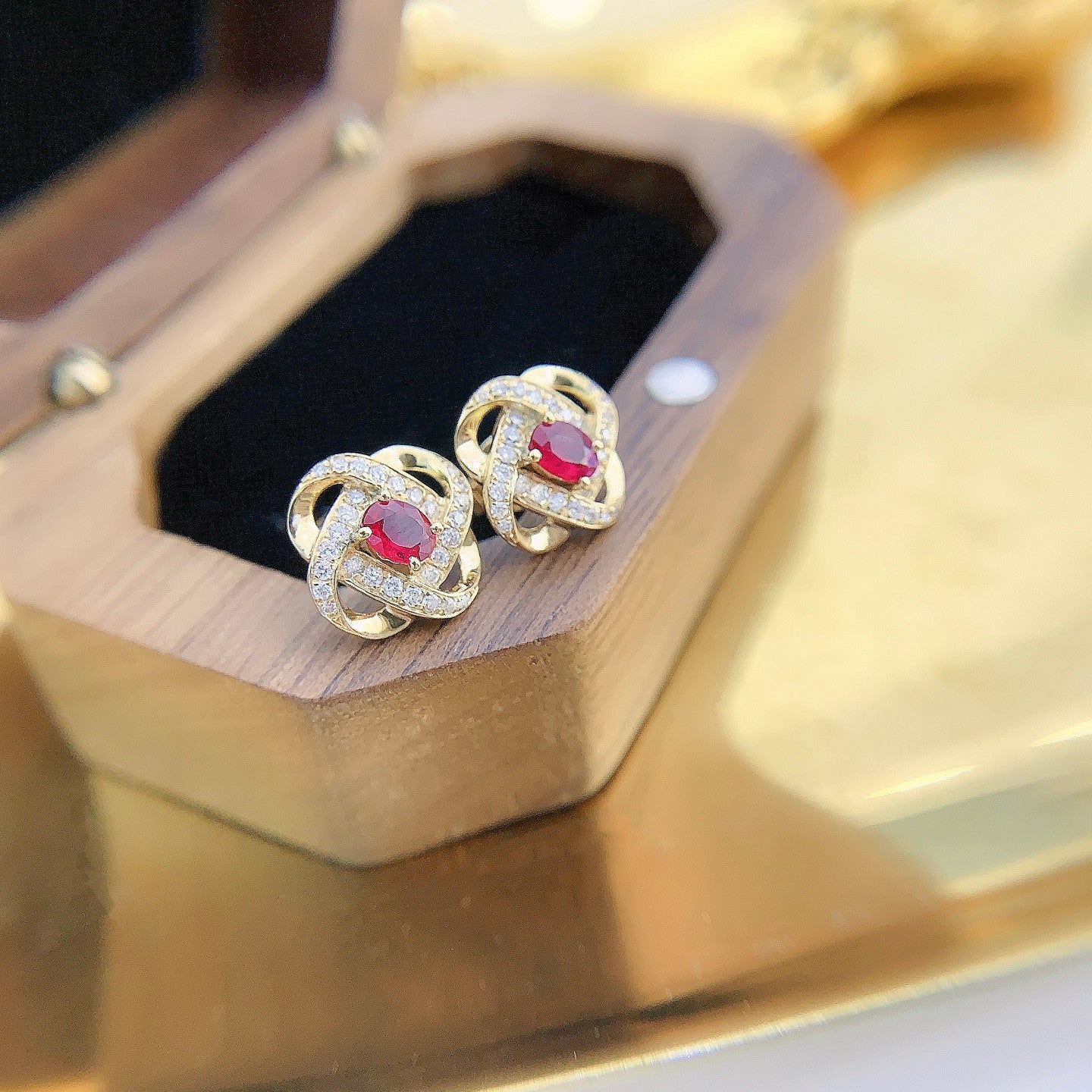 18K Rose Gold Irregular Hollow-out Earrings with Red Gemstones | Luxury Jewelry Jeweler.Jewelry