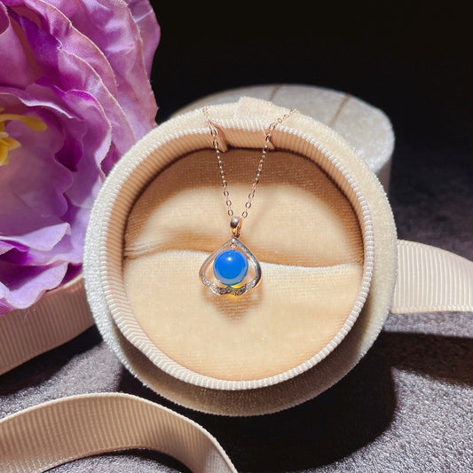 Colgante de ámbar azul dominicano incrustado en oro de 18 k: joyería exquisita para la elegancia cotidiana