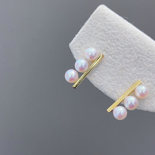 Eve-inspired Jewelry: 18K Gold Single Row Three-Pearl Earrings