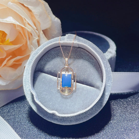 Exquisito Colgante de Ámbar Azul Dominicana Incrustado en Oro de 18K - Joyería Única