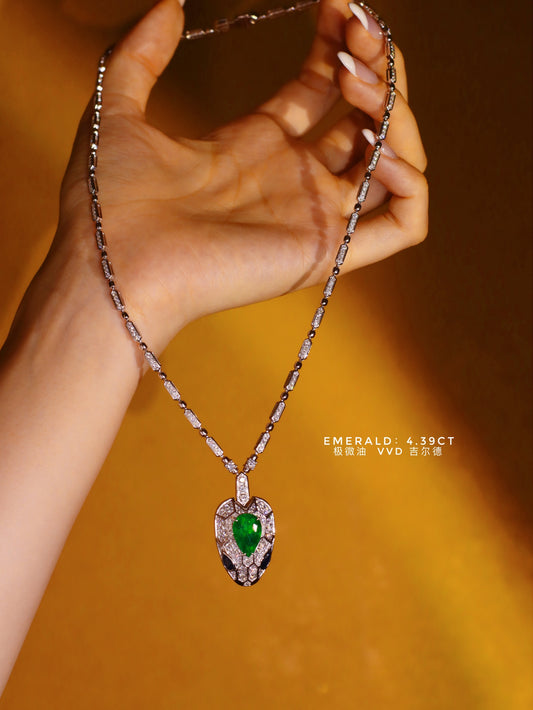 Serpentine Elegance: Emerald and Diamond Necklace Jewelry