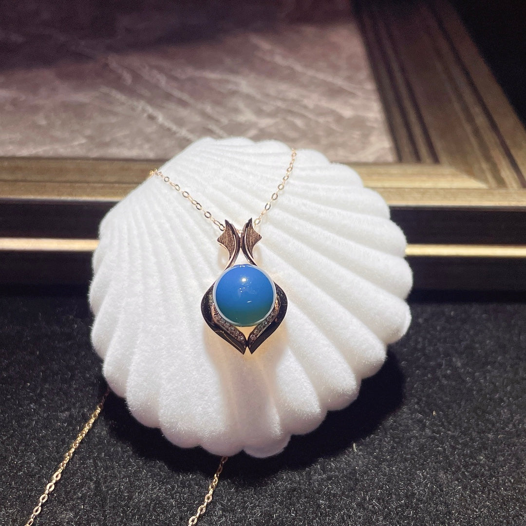 Colgante de Ámbar Azul Dominicana Incrustado en Oro de 18k - Joyería Única