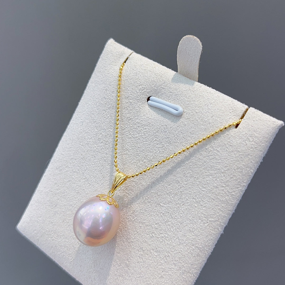 Exclusive One-of-a-Kind Jewelry: Baroque Pearl Pendant with 18K Gold Clasp