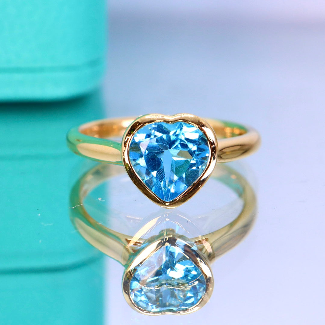 Exquisite Heart-Shaped Swiss Blue Topaz Ring in 18K Gold