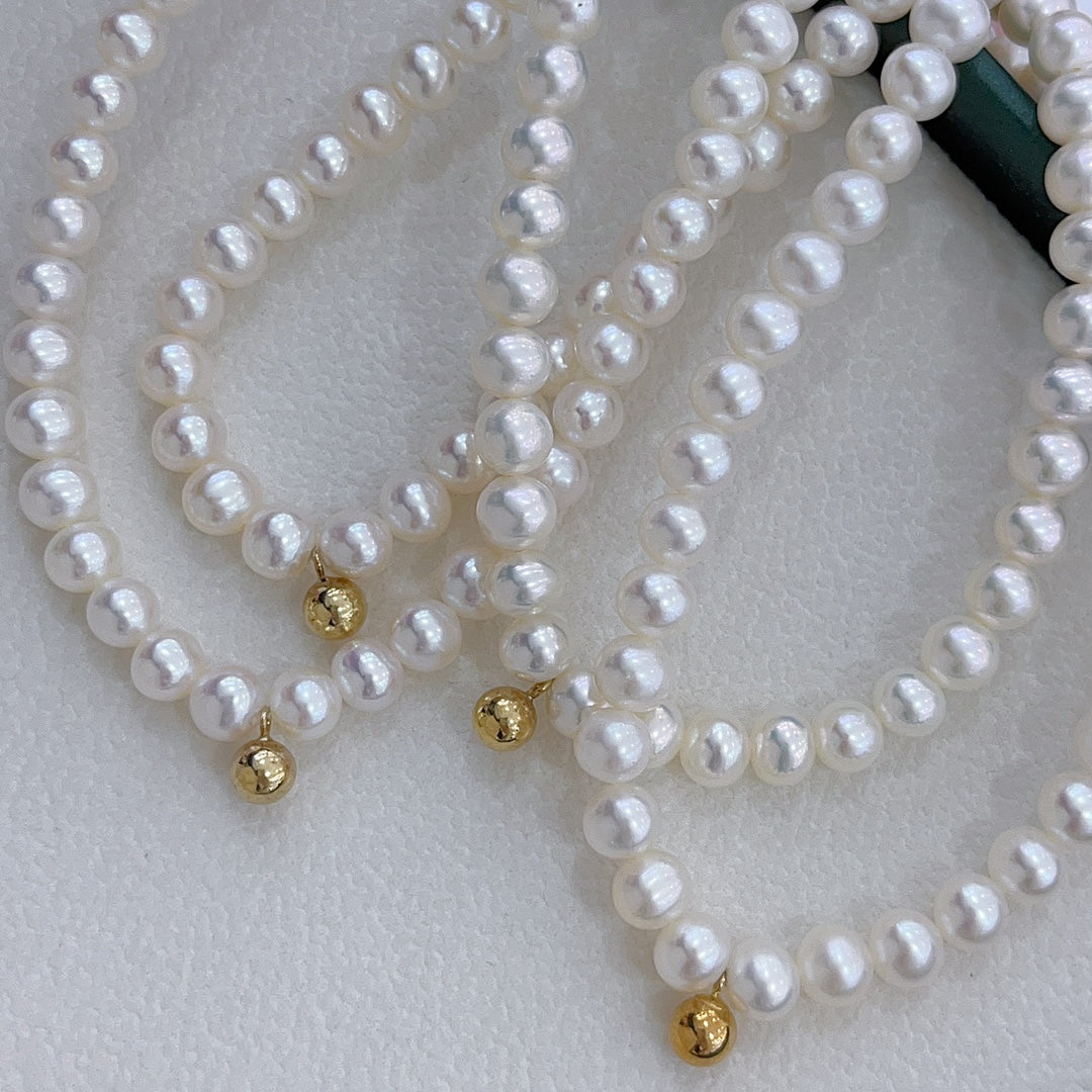 Elegant 18K Gold & Natural Freshwater Pearl Jewelry