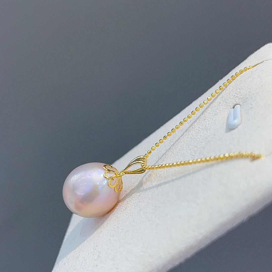 Exclusive One-of-a-Kind Jewelry: Baroque Pearl Pendant with 18K Gold Clasp