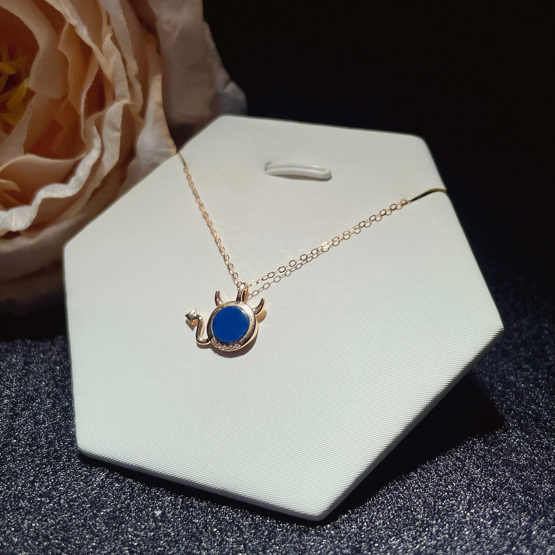 Exquisiter Anhänger aus 18-karätigem Gold mit eingebettetem dominikanischen blauen Bernstein – Schmuck für den eleganten Menschen