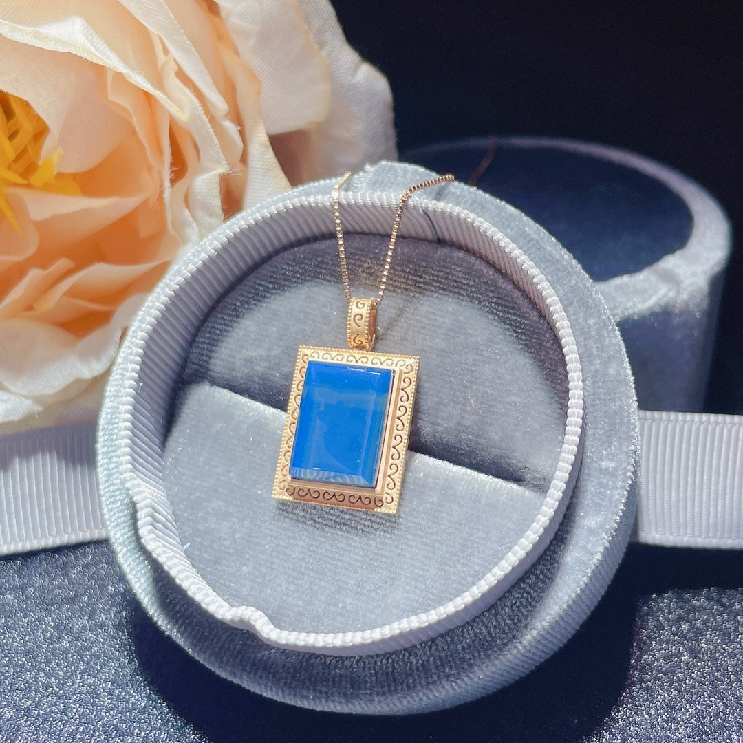 Umarmen Sie jeden Tag mit Freude 💛 - Anhängerschmuck aus 18 Karat Gold mit eingebettetem dominikanischen blauen Bernstein