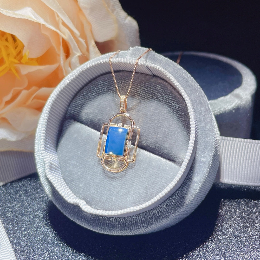 Exquisiter Anhänger aus 18-karätigem Gold mit eingebettetem dominikanischen blauen Bernstein – einzigartiger Schmuck