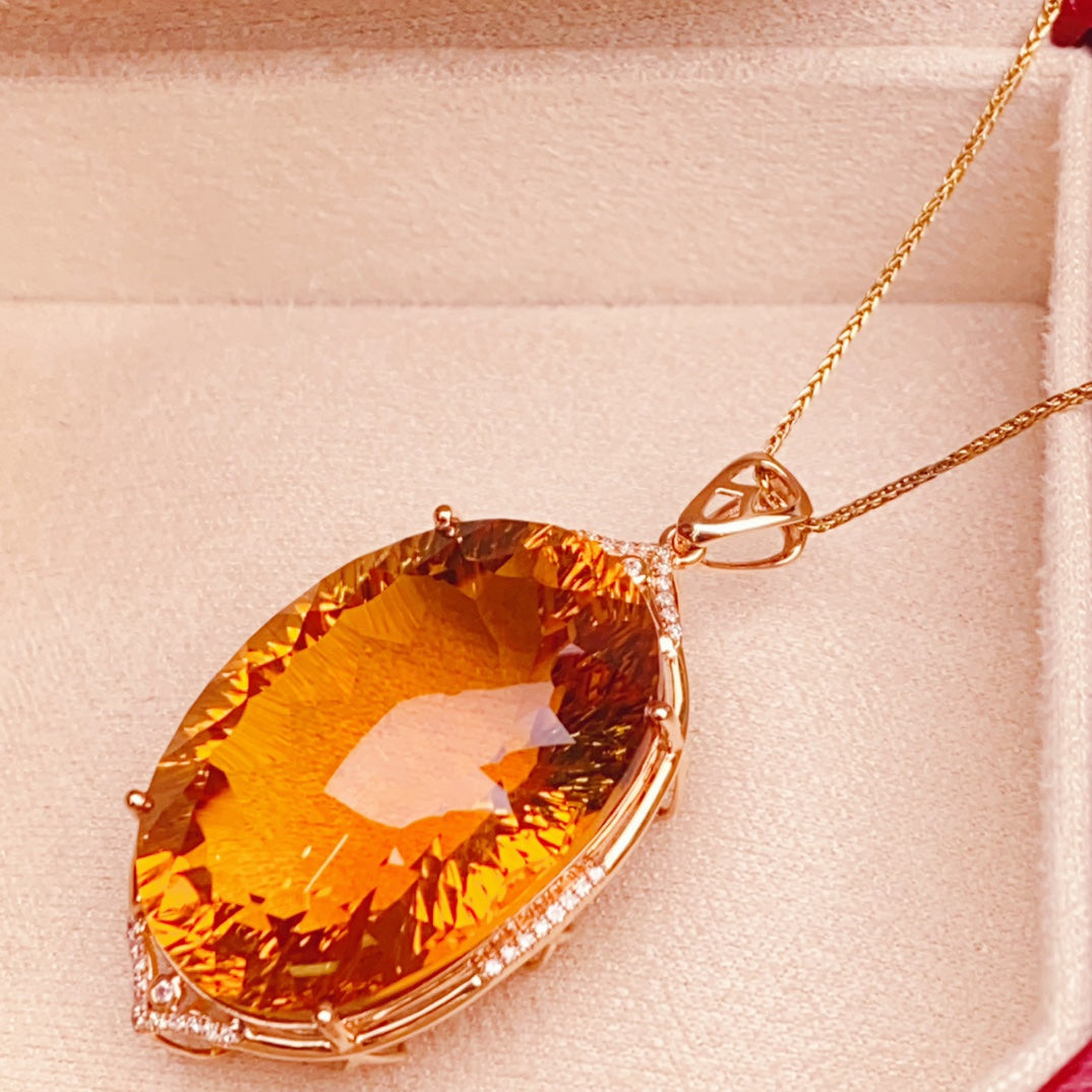 Charme rayonnant semblable à un soleil : bijoux pendentif en citrine jaune incrustés d'or 18 carats