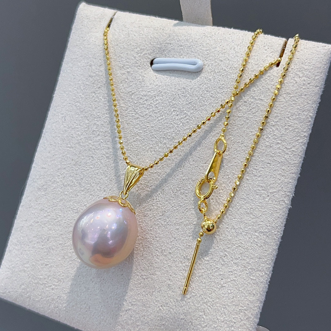 Exclusive One-of-a-Kind Jewelry: Baroque Pearl Pendant with 18K Gold Clasp