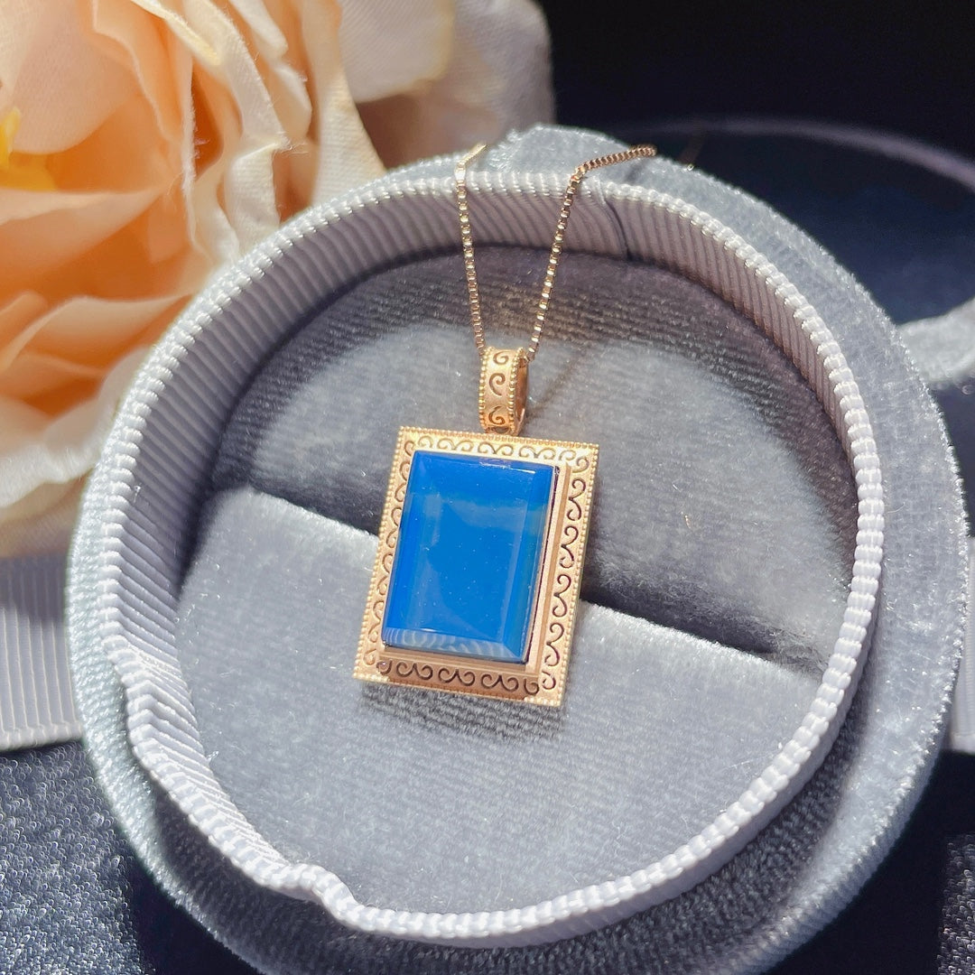 Umarmen Sie jeden Tag mit Freude 💛 - Anhängerschmuck aus 18 Karat Gold mit eingebettetem dominikanischen blauen Bernstein