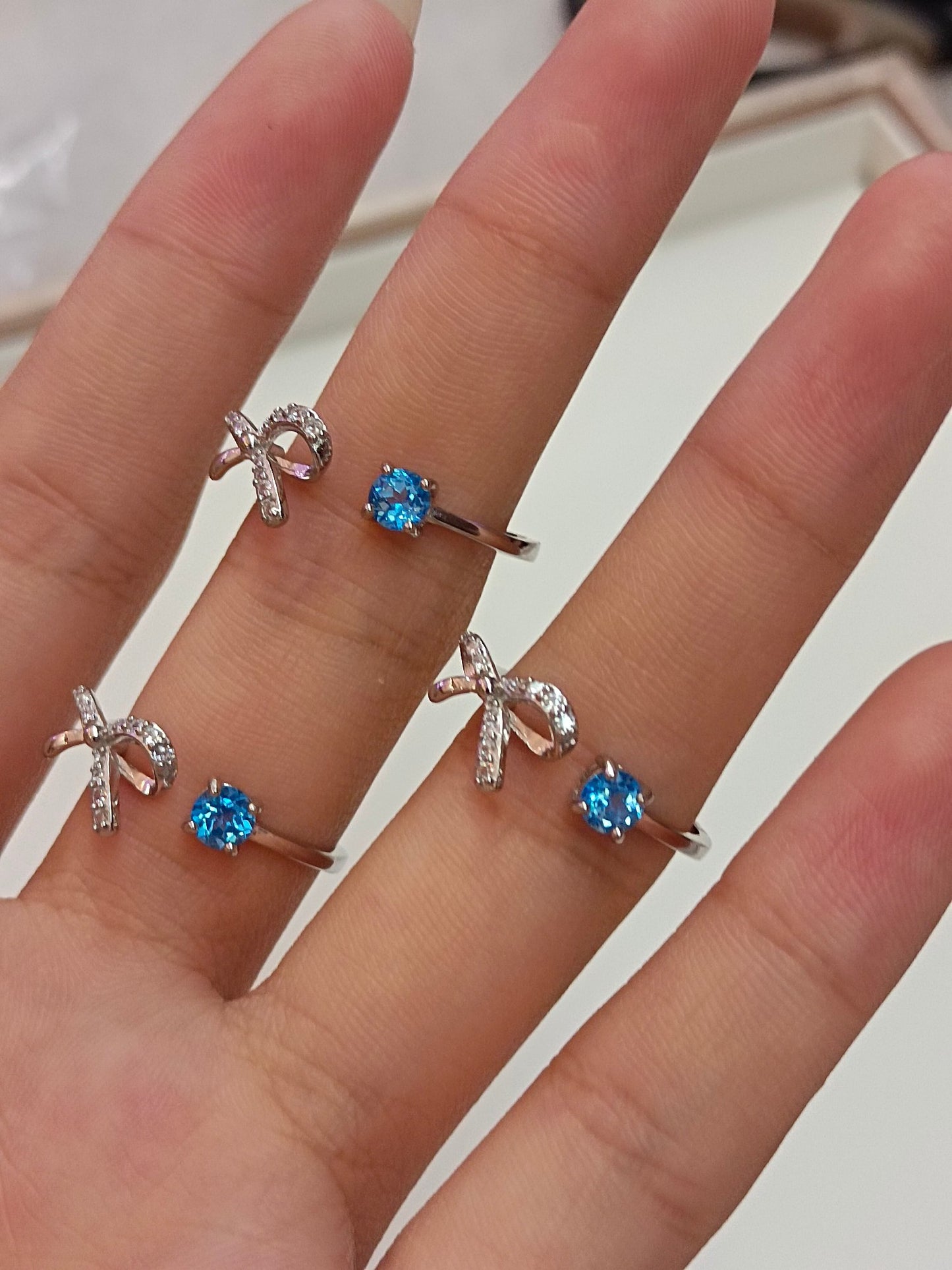 S925 Silver Embedded Sky Blue Topaz Bowknot Ring - Fashionable Jewelry