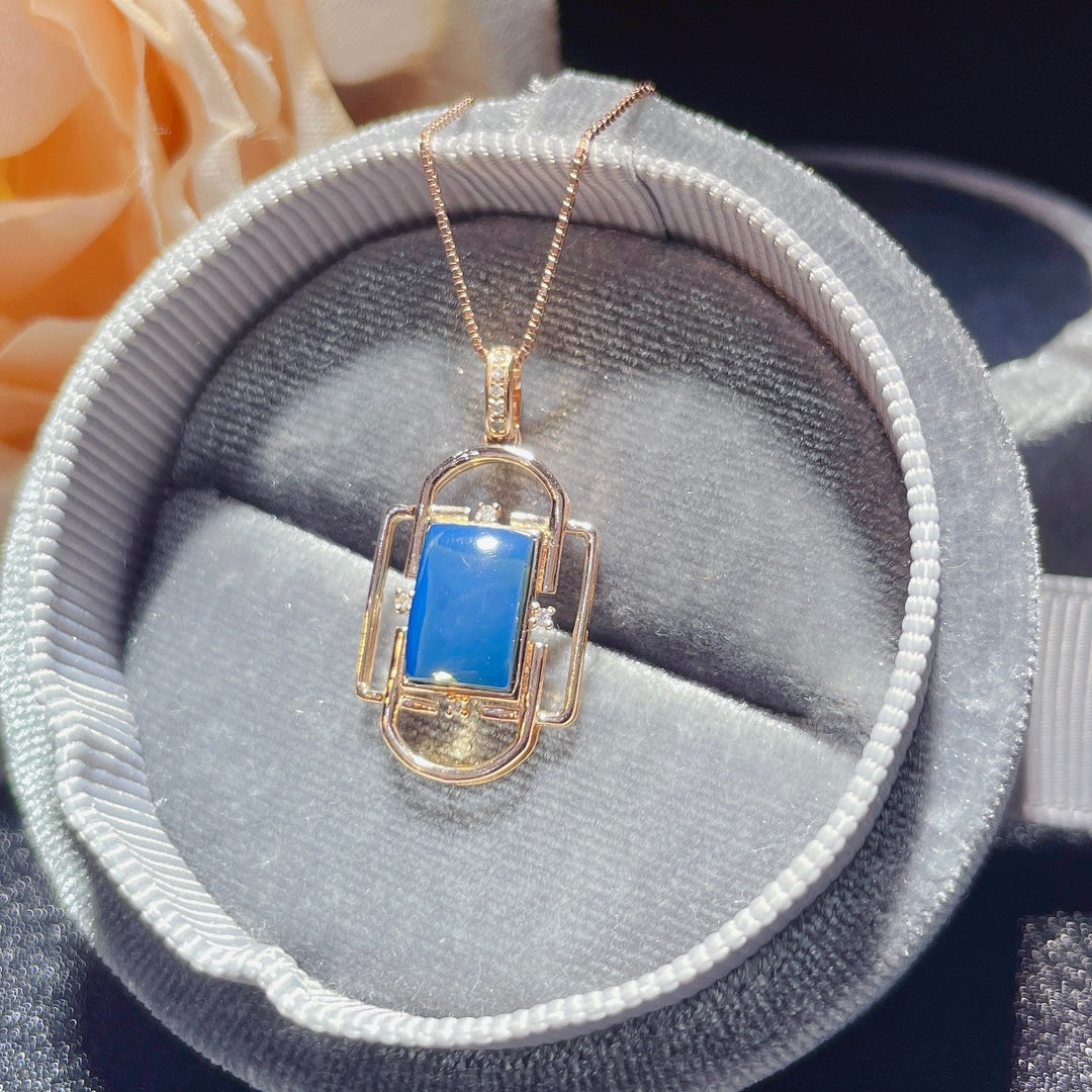 Exquisiter Anhänger aus 18-karätigem Gold mit eingebettetem dominikanischen blauen Bernstein – einzigartiger Schmuck