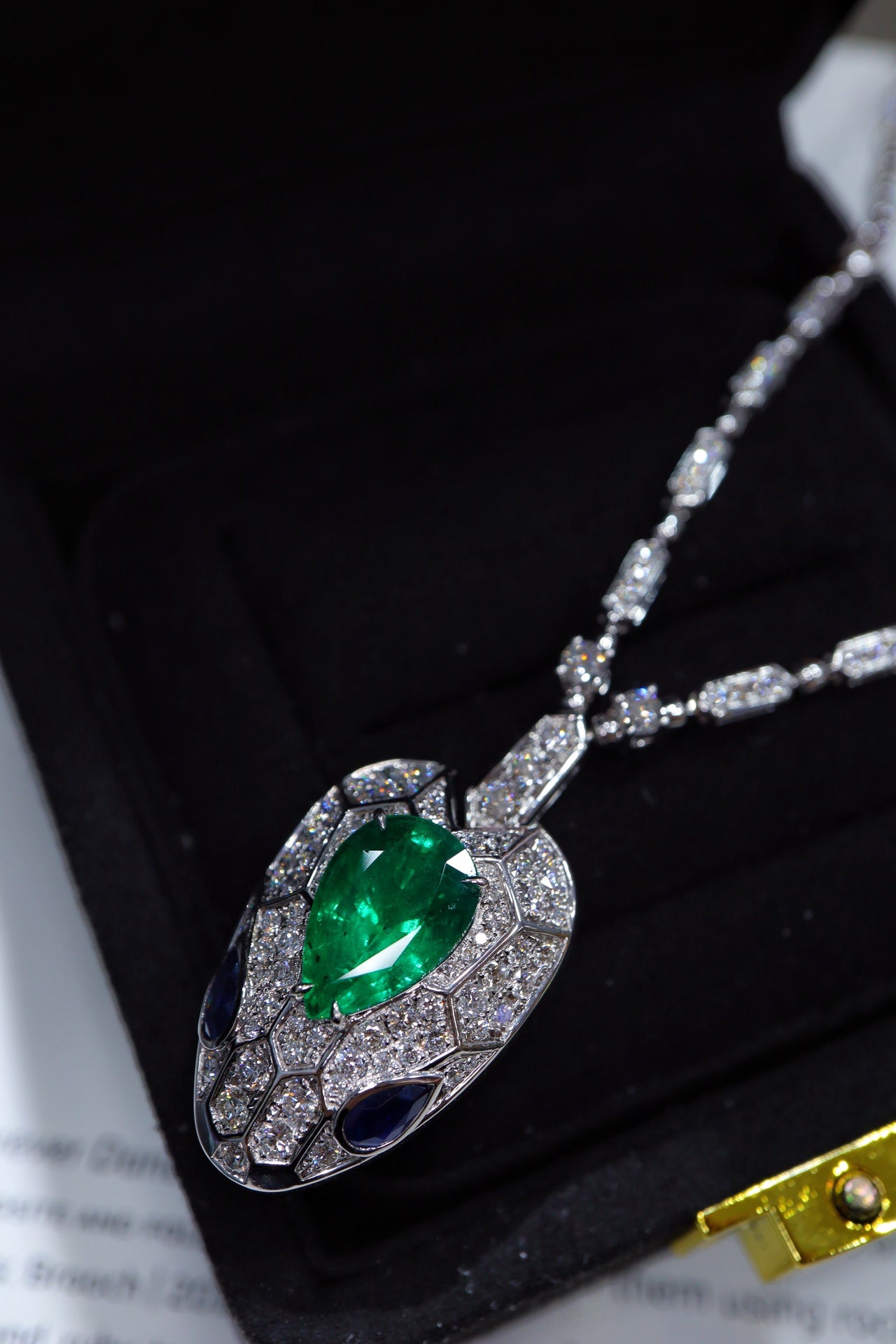 Serpentine Elegance: Emerald Diamond Necklace Jewelry