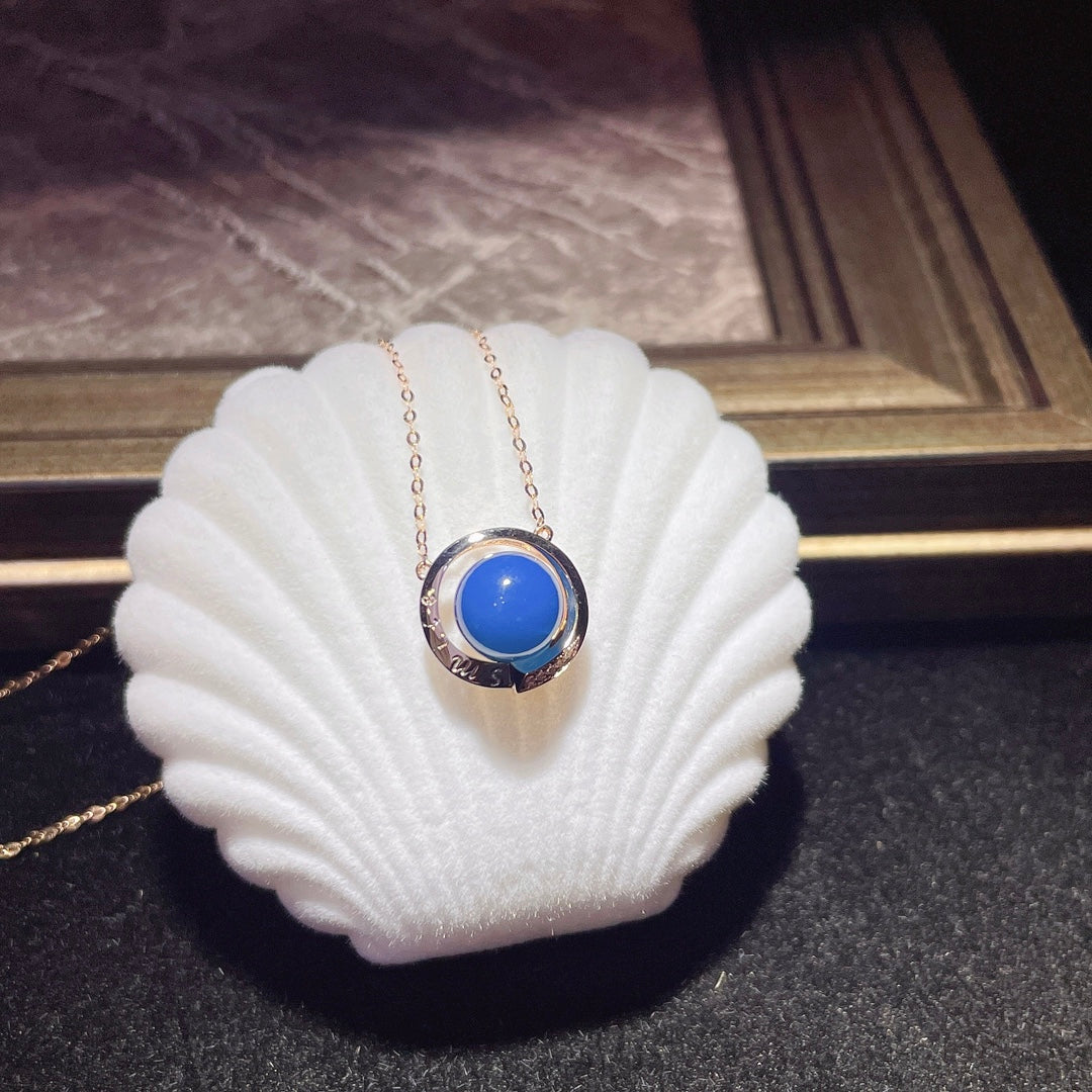 Elegante Colgante de Ámbar Azul Dominicana Incrustado en Oro de 18k - Joyería Única