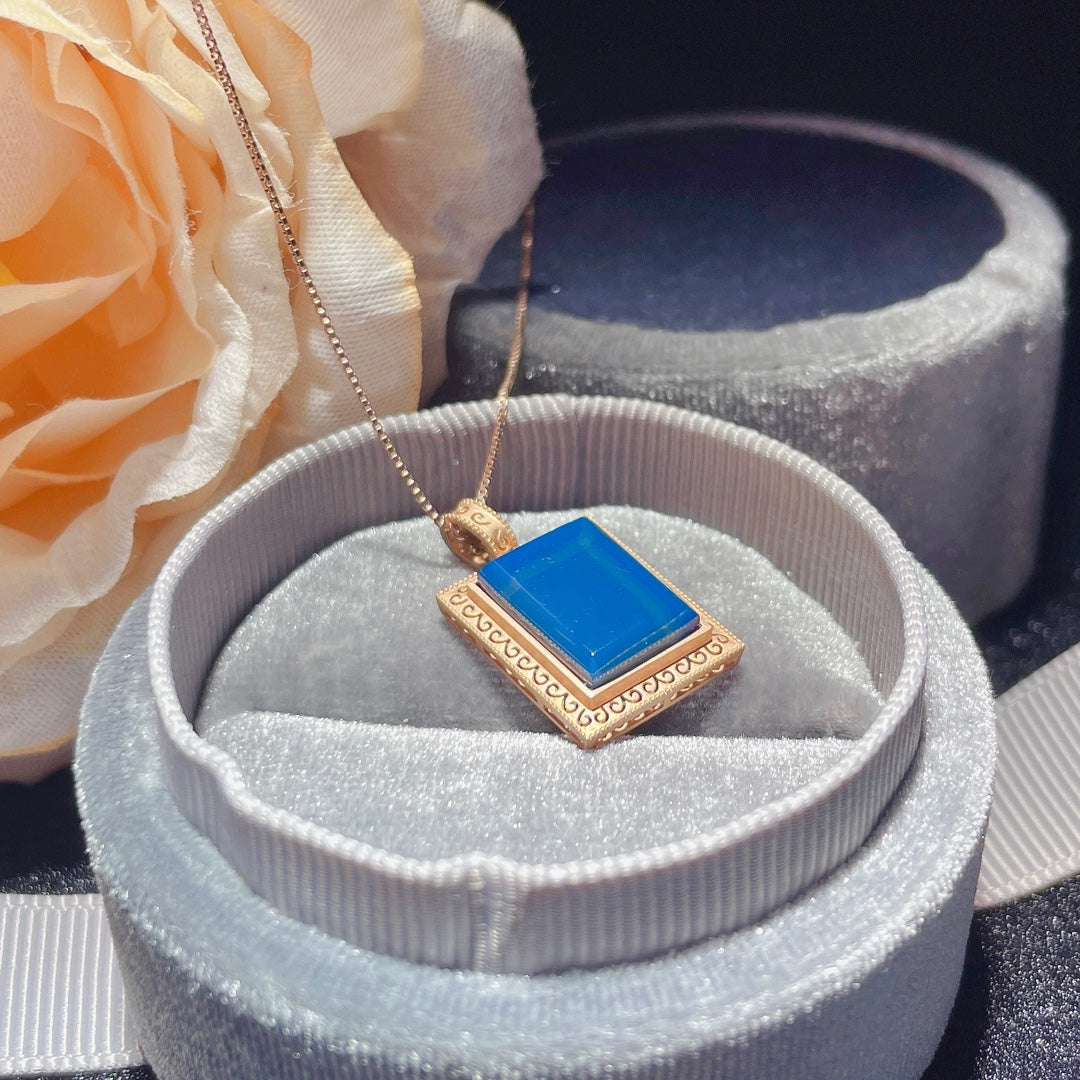 Umarmen Sie jeden Tag mit Freude 💛 - Anhängerschmuck aus 18 Karat Gold mit eingebettetem dominikanischen blauen Bernstein