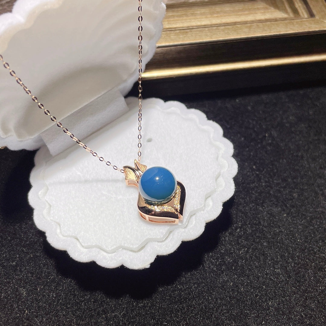 Colgante de Ámbar Azul Dominicana Incrustado en Oro de 18k - Joyería Única