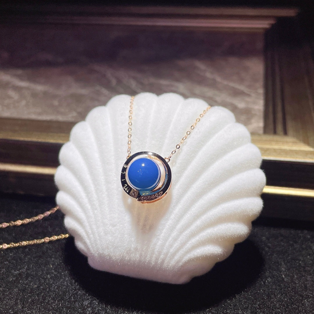 Elegante Colgante de Ámbar Azul Dominicana Incrustado en Oro de 18k - Joyería Única