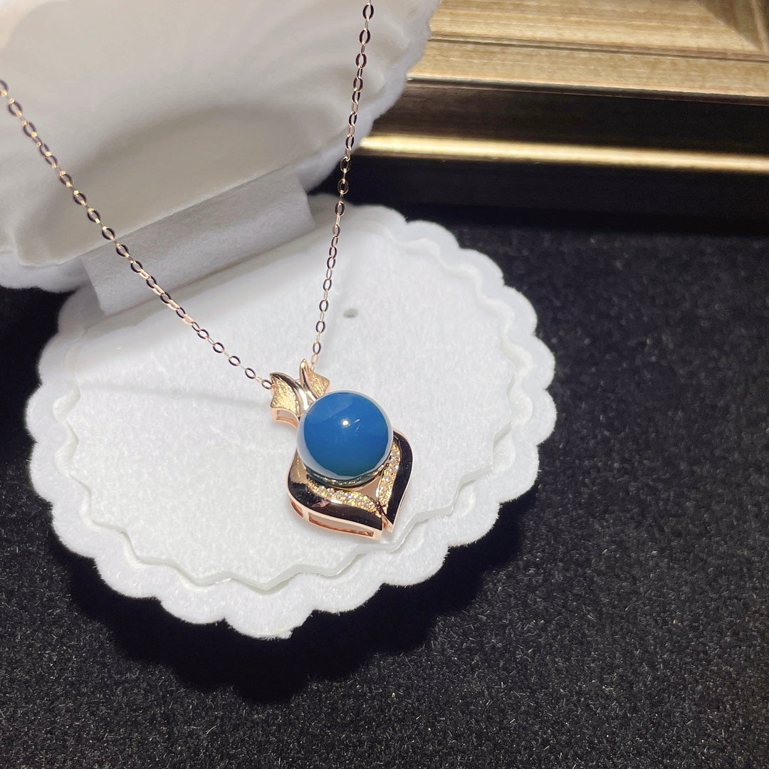 Colgante de Ámbar Azul Dominicana Incrustado en Oro de 18k - Joyería Única