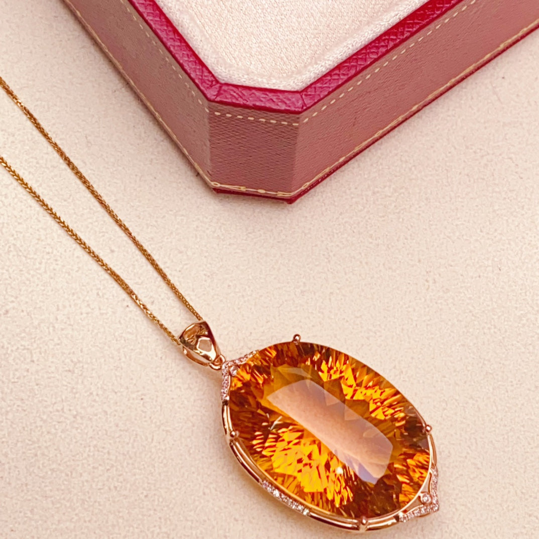 Charme rayonnant semblable à un soleil : bijoux pendentif en citrine jaune incrustés d'or 18 carats