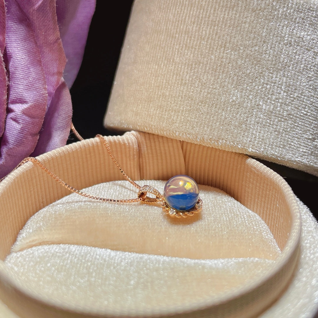 Exquisito Colgante de Ámbar Azul Dominicana Incrustado en Oro de 18K - Joyería Única