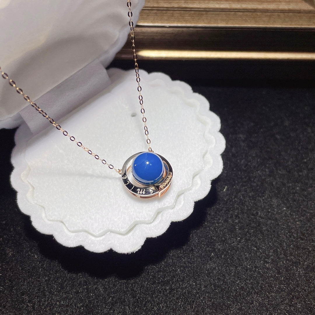 Elegante Colgante de Ámbar Azul Dominicana Incrustado en Oro de 18k - Joyería Única