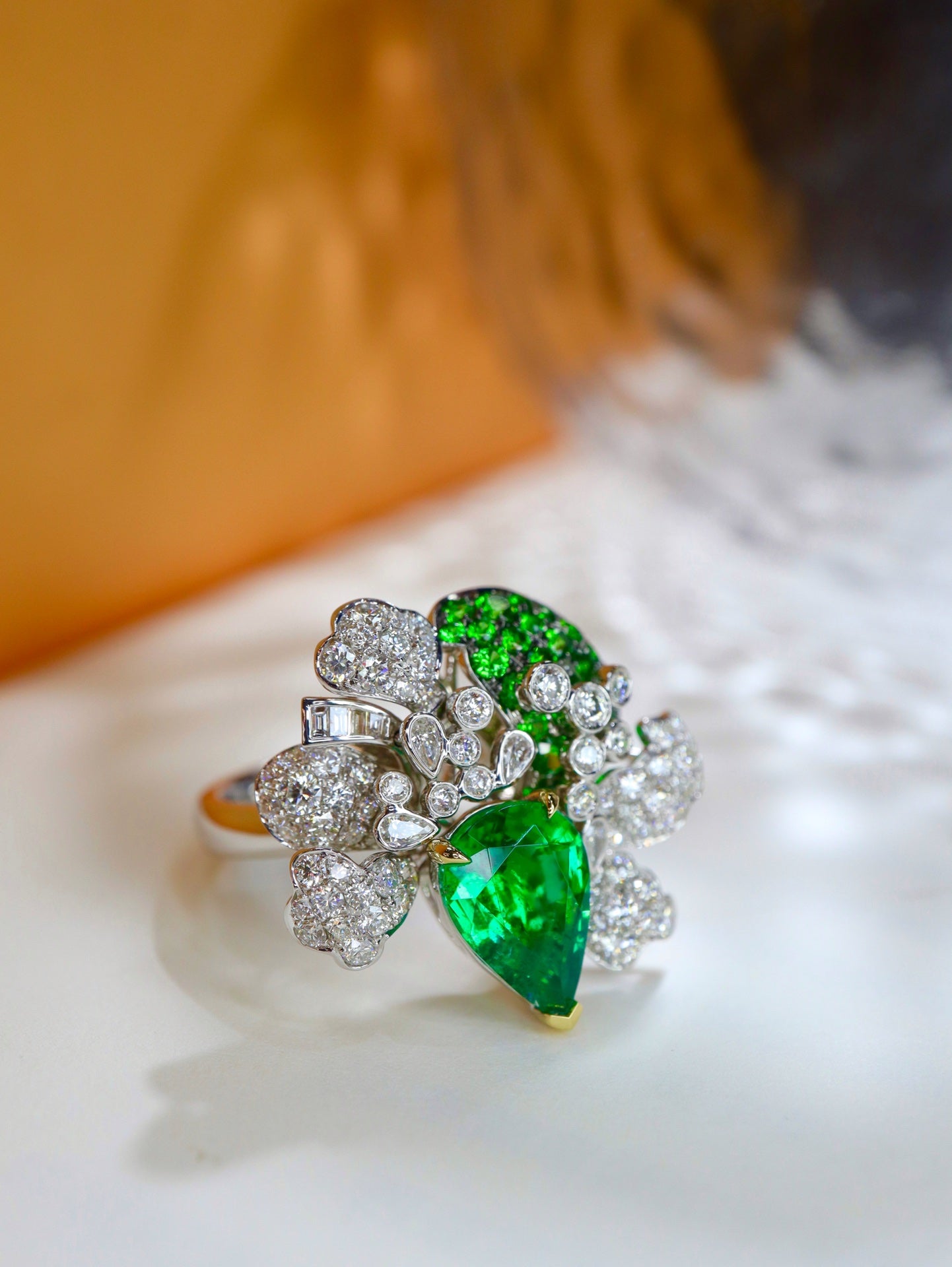 Emerald Flower Jewelry Design with Sparkling Diamonds