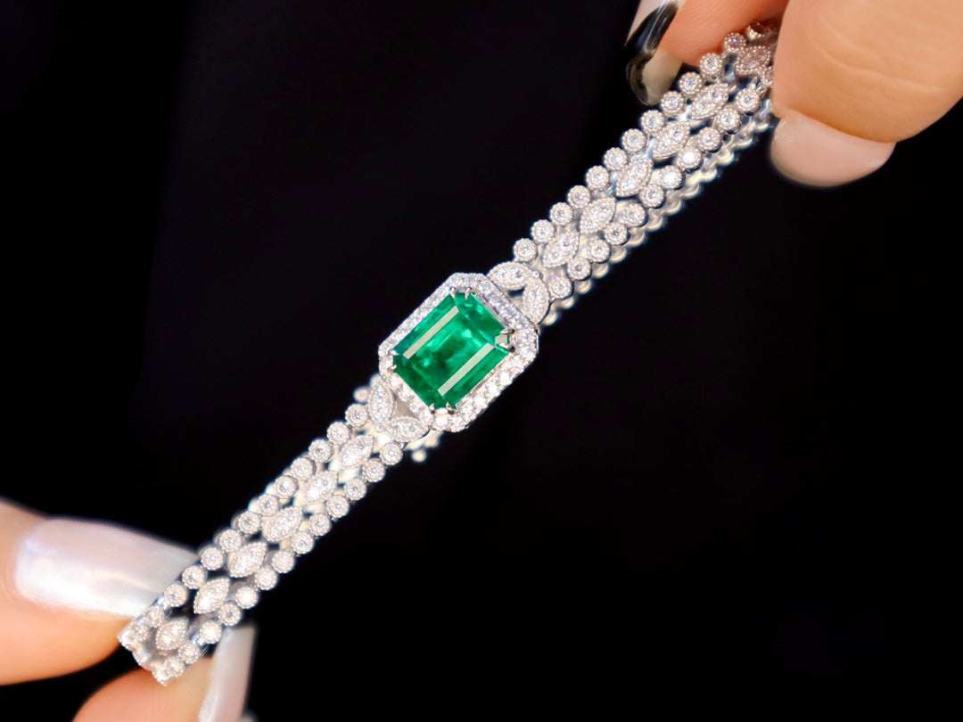 Wide Diamond Emerald Bracelet: Luxurious Lace-Like Jewelry