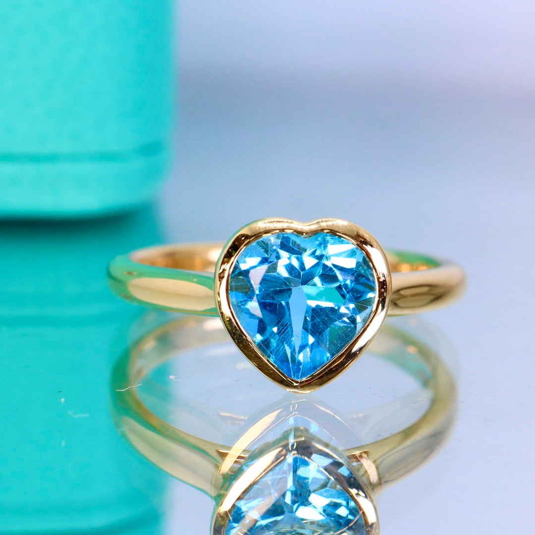 Exquisite Heart-Shaped Swiss Blue Topaz Ring in 18K Gold