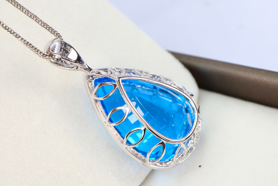 Exquisite Swiss Blue Topaz Pendant in 18K Gold with Diamonds - A Jewelry Must-Have