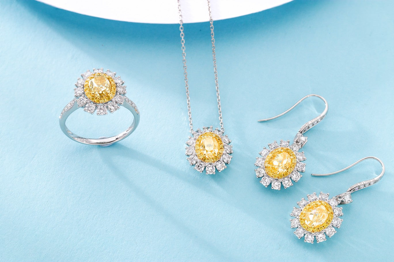 Celebrate with Our New Jewelry Arrival: Yellow Diamond Oval Halo Earclips Jeweler.Jewelry