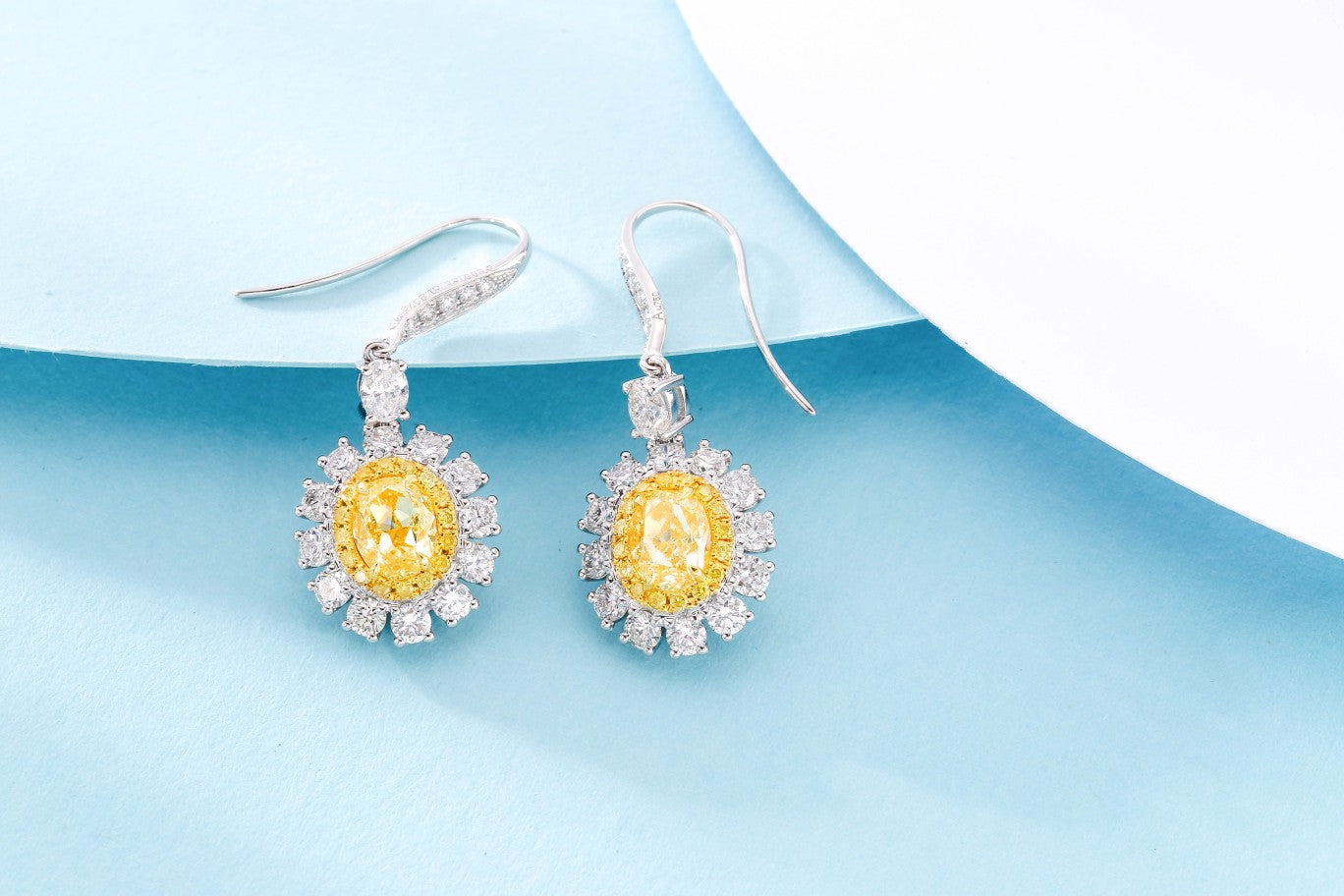 Celebrate with Our New Jewelry Arrival: Yellow Diamond Oval Halo Earclips Jeweler.Jewelry