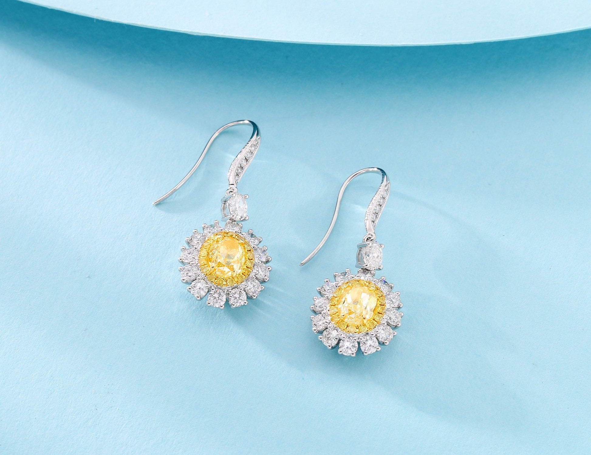 Celebrate with Our New Jewelry Arrival: Yellow Diamond Oval Halo Earclips Jeweler.Jewelry