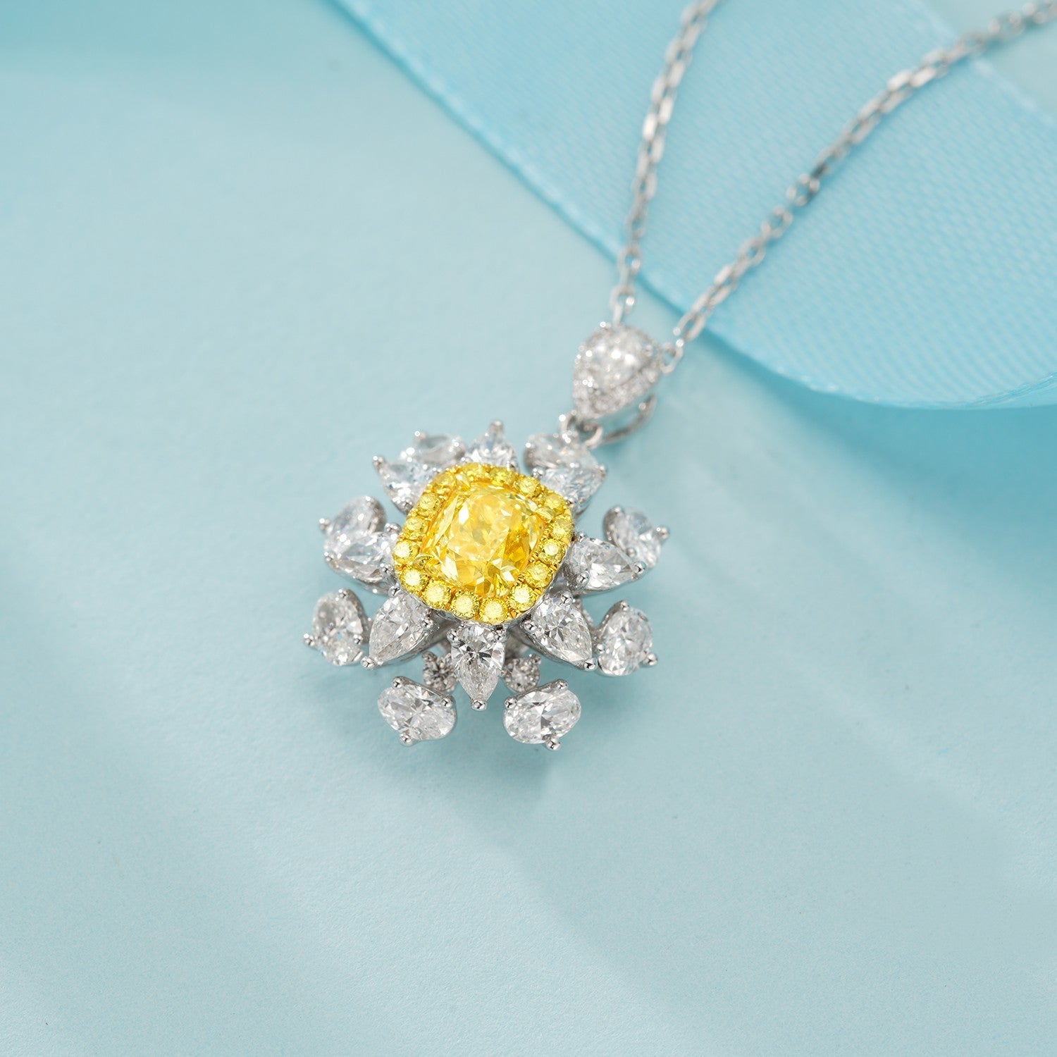 Crafted Elegance: Cushion Teardrop and Oval Diamond Suite Jewelry - Yellow Diamond Ring