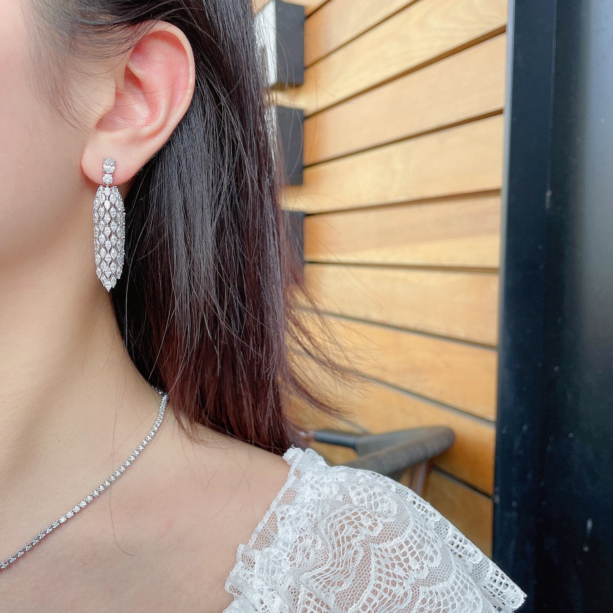 Dazzling Arc-Shaped Tassel Earrings in Jewelry Collection - Jeweler.Jewelry