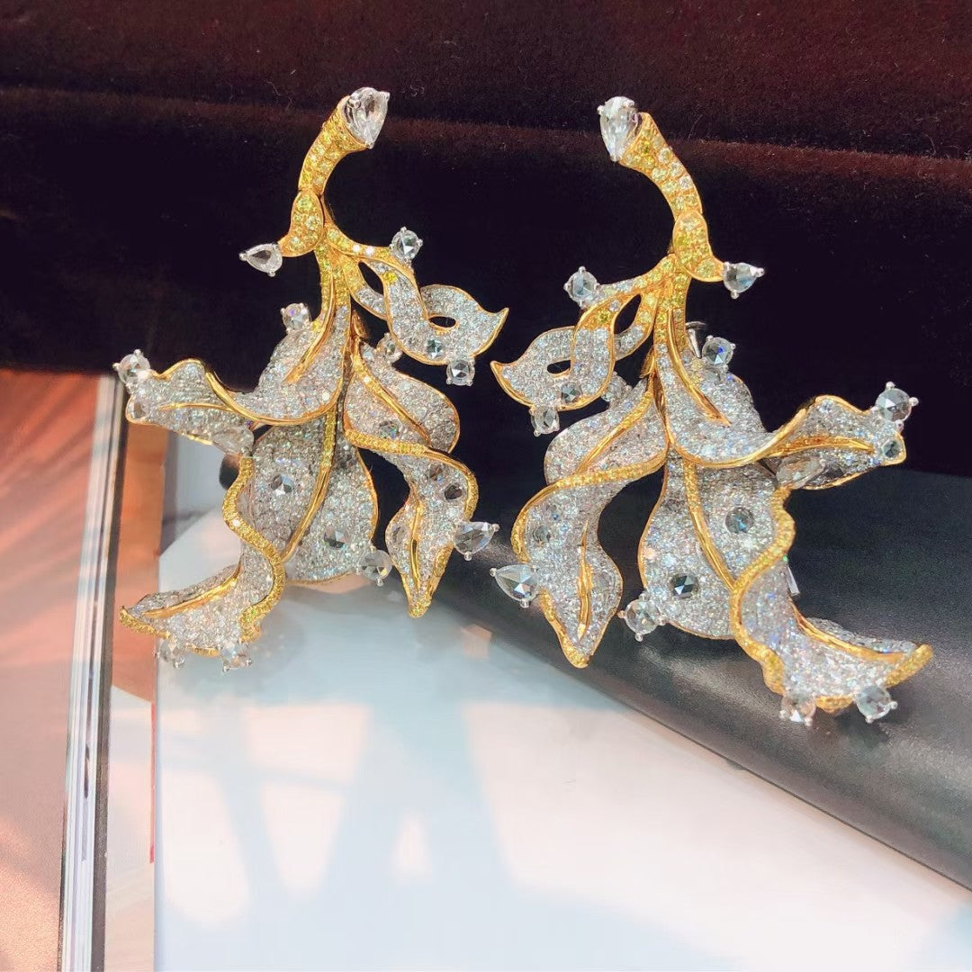 {Elegant Leaf Earrings with Diamond Accent - A Must-Have Jewelry Piece} Jeweler.Jewelry