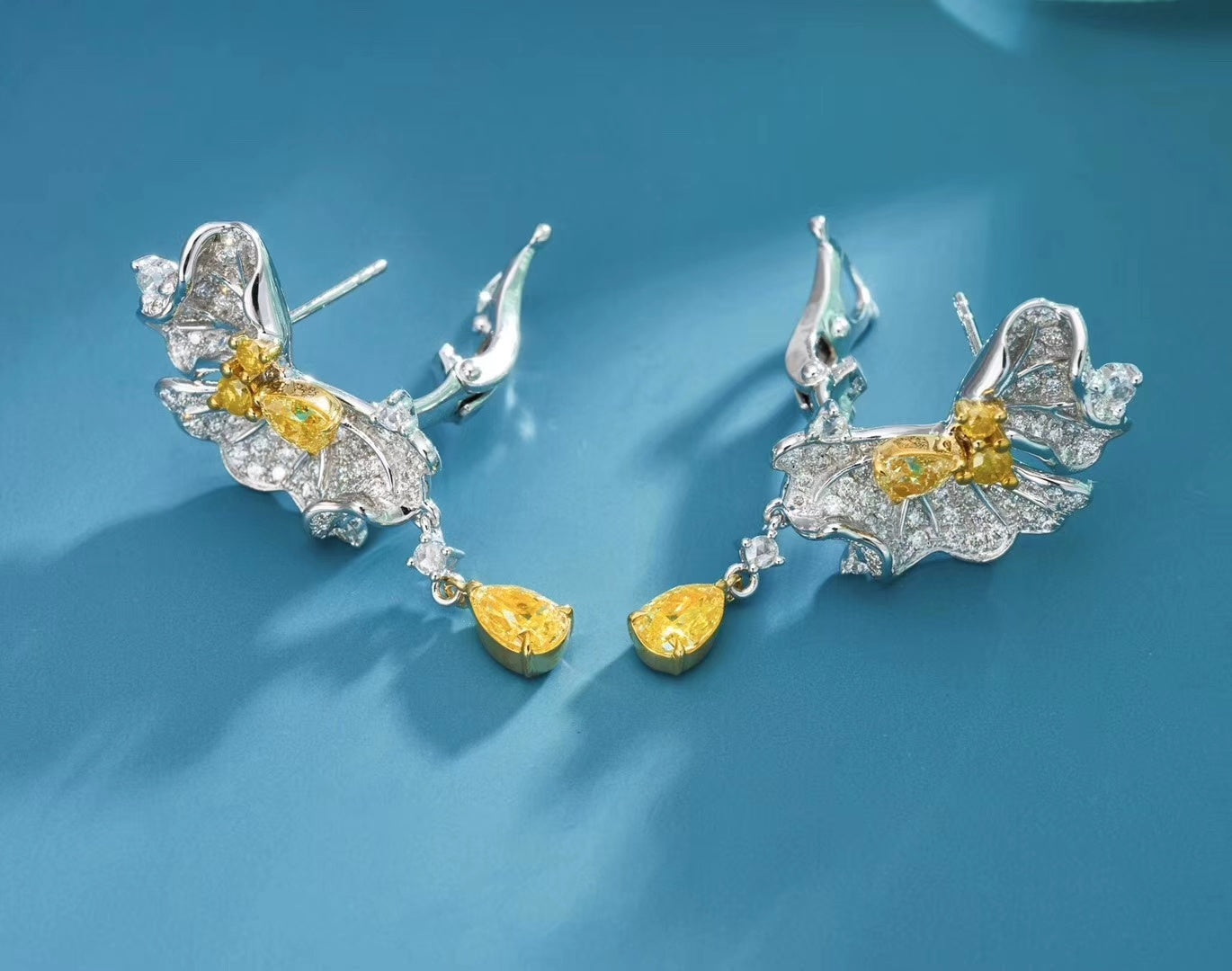 Elegant Leaf-Shaped Diamond Earrings with Dewdrop Design Jeweler.Jewelry