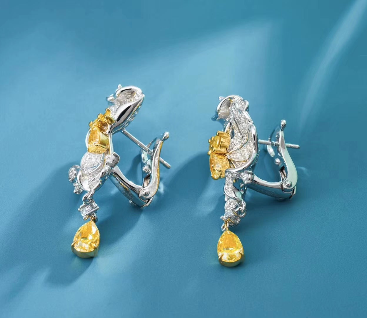 Elegant Leaf-Shaped Diamond Earrings with Dewdrop Design Jeweler.Jewelry