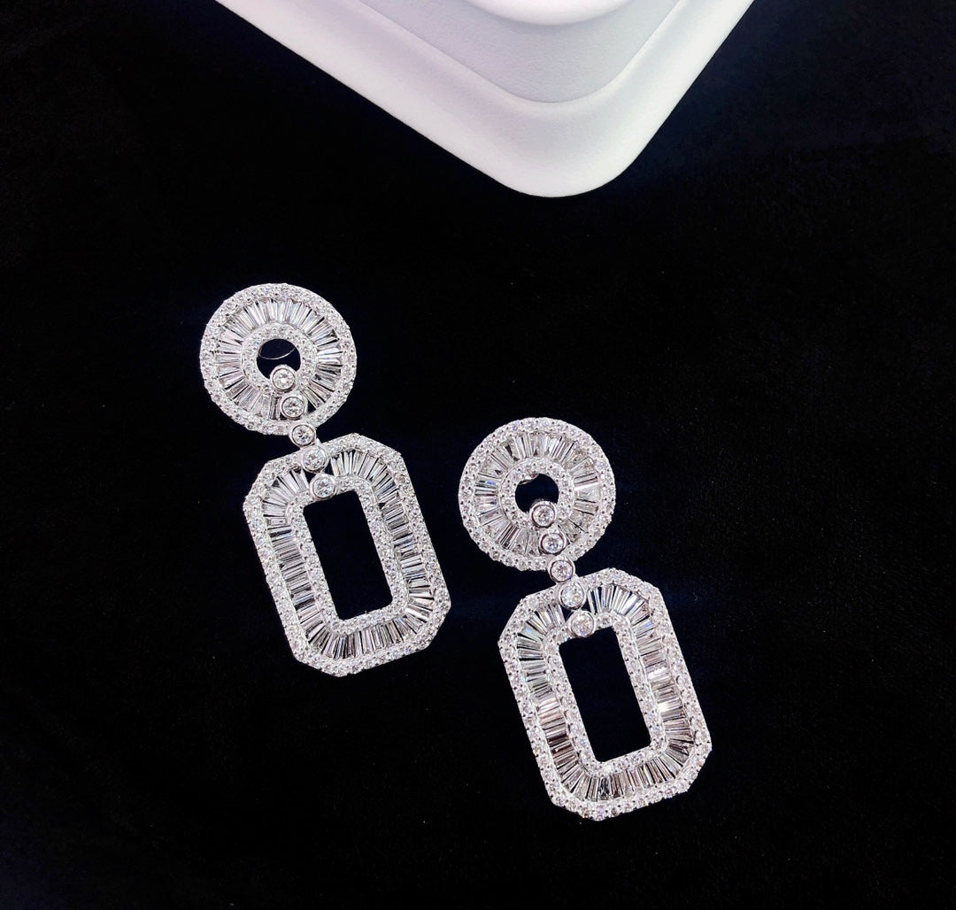 Glamorous T-Shape Round Earrings in Jewelry Collection - Jeweler.Jewelry