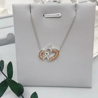 Chic and Elegant: The 18k Gold Diamond Two-Tone Heart Necklace